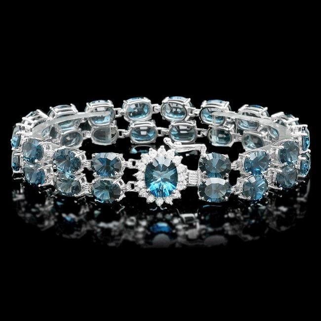 14k Gold 48.5ct Topaz 0.60ct Diamond Bracelet: Retail: $13,890.00 ****** 14k Gold 48.5ct Topaz 0.60ct Diamond Bracelet ****** Metal: 14k Solid White Gold / Size: 7.5 / Total Item Weight: 26.0 grams / Country Made: United States / / Main Stone: Top