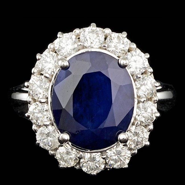 14k Gold 5.50ct Sapphire 1.50ct Diamond Ring: Retail: $12,800.00 ****** 14k Gold 5.50ct Sapphire 1.50ct Diamond Ring ****** Metal: 14k Solid White Gold / Size: 7.5 / Total Item Weight: 6.7 grams / Country Made: United States / / Main Stone: Sapph