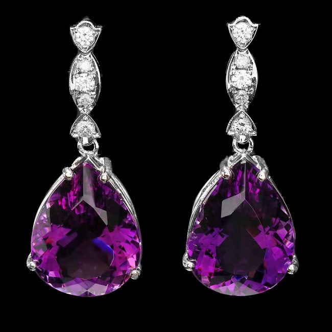 14k Gold 30ct Amethyst 0.55ct Diamond Earrings: Retail: $14,820.00******14k White Gold 30.00ct Amethyst 0.55ct Diamond Earrings ****** Metal: 14k Solid White Gold / Size: 7 / Total Item Weight: 13.0 grams / Country Made: USA / / Main Stone: Amethys