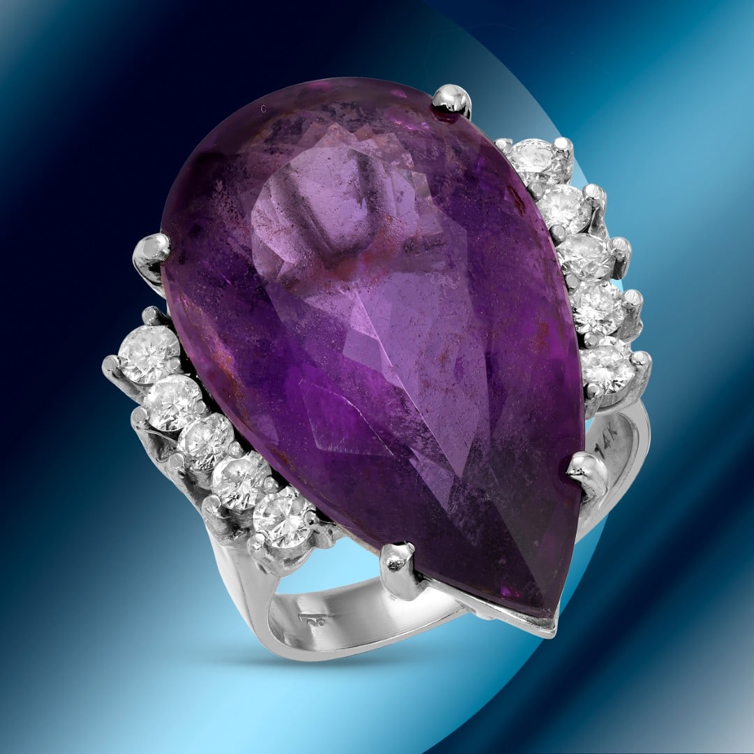 14K Gold 21.70cts Amethyst & 0.80cts Diamond Ring: Retail: $9,840*****14K Gold Amethyst & Diamond Ring*****Metal: 14K White Gold/ Total Wt.: 12.7g / Country Made US// Main Stone: Amethyst / Carat Total Wt.:21.70cts / Treatment: none / Color: Purple / 