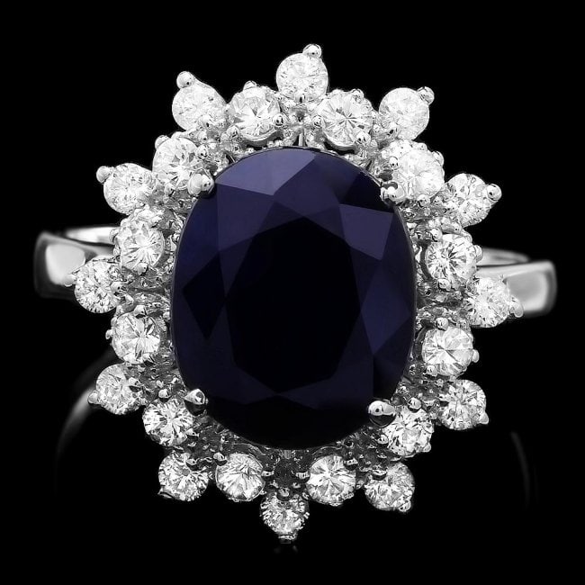 14k Gold 4.00ct Sapphire 0.75ct Diamond Ring: Retail: $3,500.00 ****** 14k Gold 4.00ct Sapphire 0.75ct Diamond Ring ****** Metal: 14k Solid White Gold / Size: 7 / Total Item Weight: 4.5 grams / Country Made: United States / / Main Stone: Sapphire