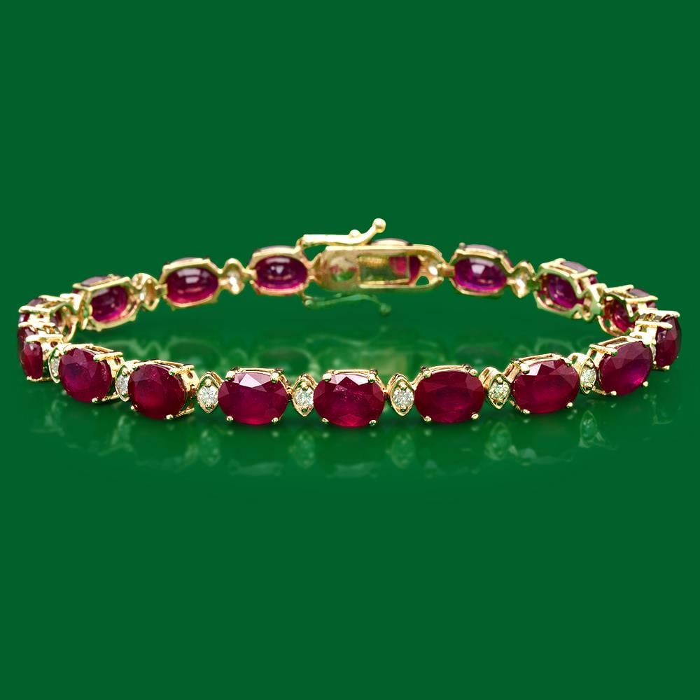 14k Gold 31.62ct Ruby 0.85ct Diamond Bracelet: Retail: $14,500.00 ****** 14k Gold 31.62ct Ruby 0.85ct Diamond Bracelet ****** Metal: 14k Solid Yellow Gold / Total Item Weight: 17.7 grams / Country Made: United States / / Main Stone: Ruby / Color: 