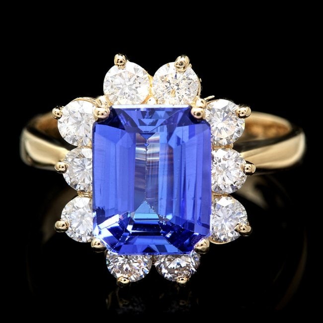 14k Gold 3.00ct Tanzanite 1.20ct Diamond Ring: Retail: $18,950.00 ****** 14k Gold 3.00ct Tanzanite 1.20ct Diamond Ring ****** Metal: 14k Solid Yellow Gold / Size: 7.25 / Total Item Weight: 5.5 grams / Country Made: United States / / Main Stone: Ta