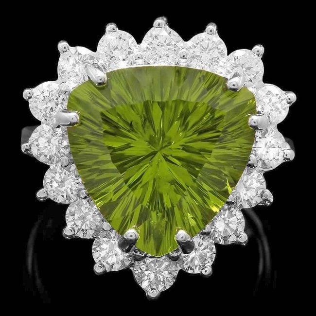 14k White Gold 9.50ct Peridot 1.80ct Diamond Ring: Retail: $12,400.00 ****** 14k White Gold 9.50ct Peridot 1.80ct Diamond Ring ****** Metal: 14k Solid White Gold / Size: 7 / Total Item Weight: 8.8 grams / / Main Stone: Peridot / Color: Green / Carat T