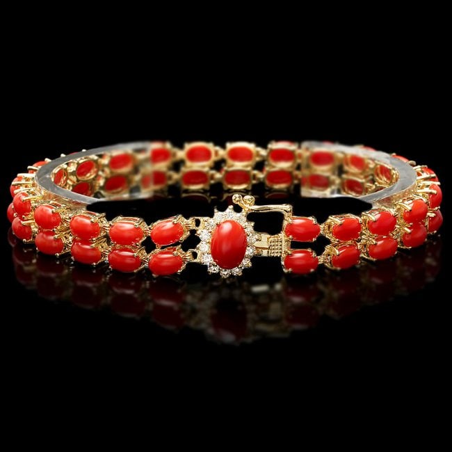 14k Gold 19ct Coral 0.50ct Diamond Bracelet: Retail: $12,300.00 ****** 14k Gold 19ct Coral 0.50ct Diamond Bracelet ****** Metal: 14k Solid Yellow Gold / Size: 7 / Total Item Weight: 18.0 grams / Country Made: United States / / Main Stone: Coral 