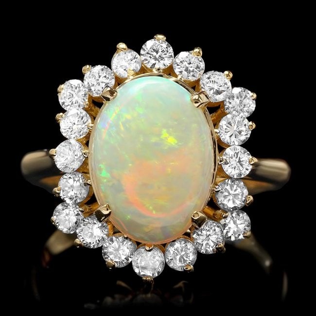 14k Yellow Gold 2.00ct Opal 1.00ct Diamond Ring: Retail: $6,200.00 ****** 14k Yellow Gold 2.00ct Opal 1.00ct Diamond Ring ****** Metal: 14k Solid Yellow Gold / Total Item Weight: 4.5 grams / Country Made: United States / / Main Stone: Opal / Color: 