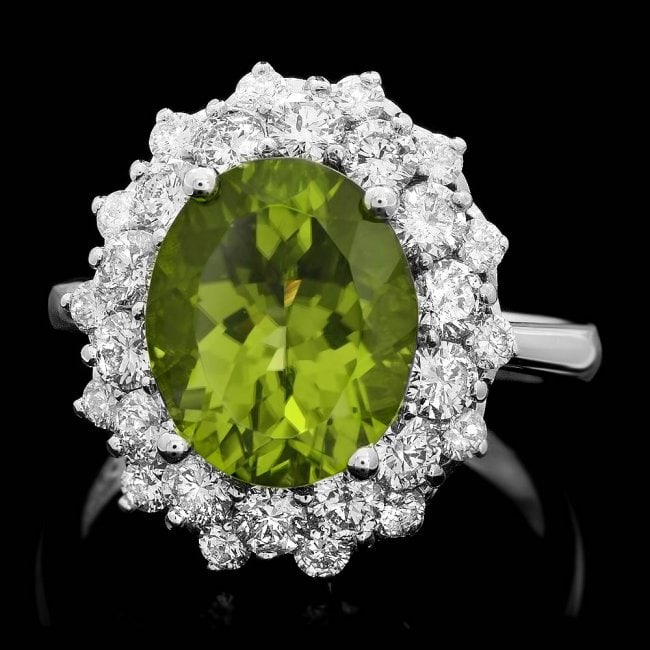 14k White Gold 5.00ct Peridot 1.60ct Diamond Ring: Retail: $7,800.00 ****** 14k White Gold 5.00ct Peridot 1.60ct Diamond Ring ****** Metal: 14k Solid White Gold / Size: 7.5 / Total Item Weight: 7.0 grams / Country Made: United States / / Main Stone: P