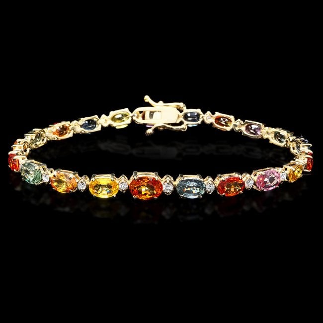 14k Gold 15.00ct Sapphire 0.70ct Diamond Bracelet: Retail: $12,400.00 ****** 14k Gold 15.00ct Sapphire 0.70ct Diamond Bracelet ****** Metal: 14k Solid Yellow Gold / Size: 7.5 / Total Item Weight: 10.5 grams / Country Made: United States / / Main Stone