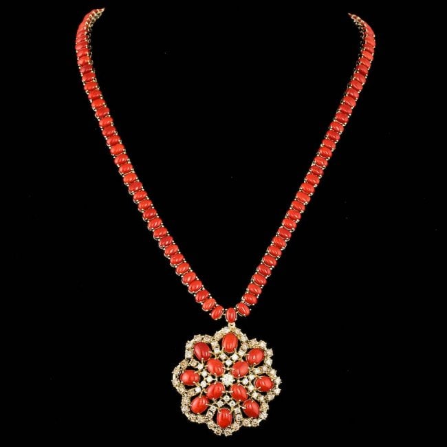 14k Gold 58.50ct Coral 5.50ct Diamond Necklace: Retail: $48,600.00 ****** 14k Gold 58.50ct Coral 5.50ct Diamond Necklace ****** Metal: 14k Solid Yellow Gold / Size: 19 / Total Item Weight: 52.5 grams / / Main Stone: Coral / Color: Orange / Carat To