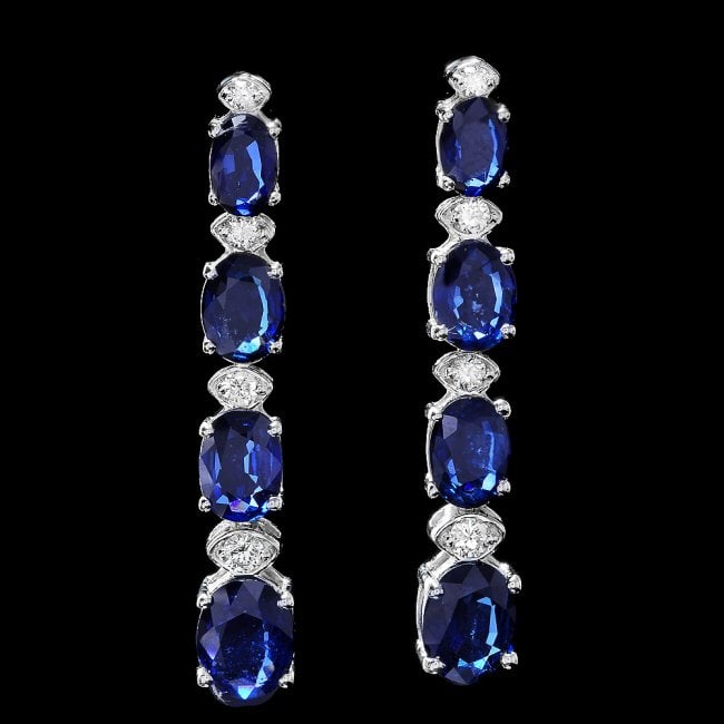 14k Gold 7ct Sapphire 0.35ct Diamond Earrings: Retail: $4,000.00 ****** 14k Gold 7ct Sapphire 0.35ct Diamond Earrings ****** Metal: 14k Solid White Gold / Total Item Weight: 5.0 grams / Country Made: United States / / Main Stone: Sapphire / Color: