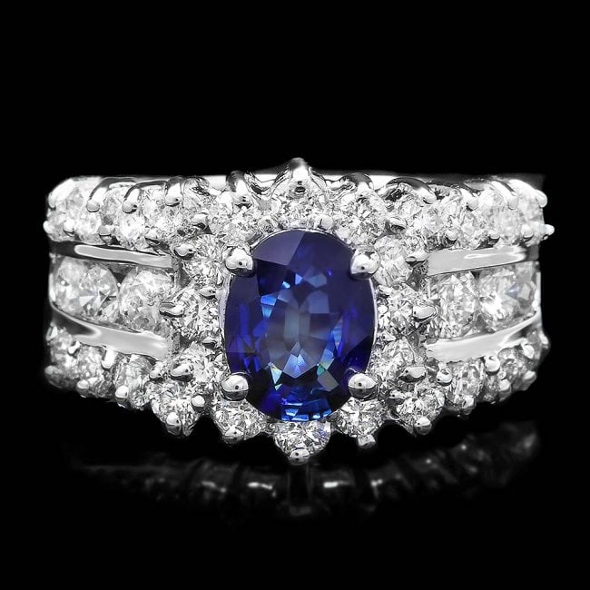 14k Gold 1.00ct Sapphire 1.55ct Diamond Ring: Retail: $8,400.00 ****** 14k Gold 1.00ct Sapphire 1.55ct Diamond Ring ****** Metal: 14k Solid White Gold / Size: 7 / Total Item Weight: 7.5 grams / Country Made: United States / / Main Stone: Sapphire