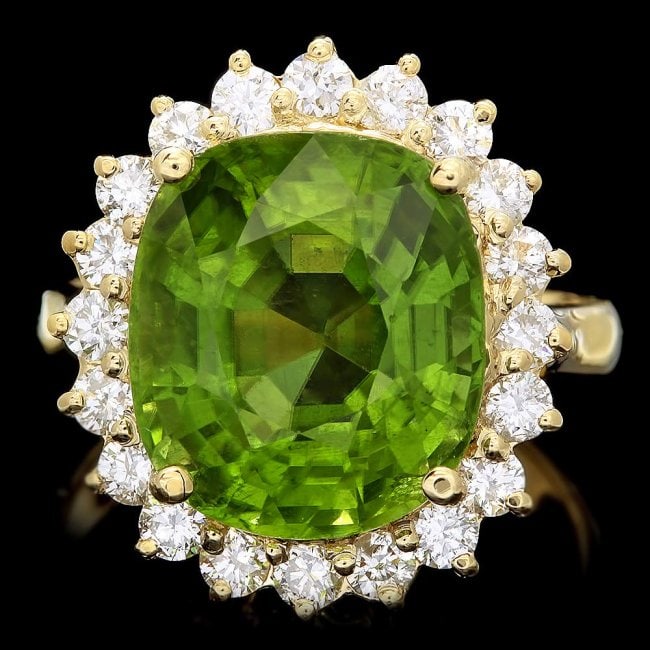 14k Gold 9.00ct Peridot 1.00ct Diamond Ring: Retail: $10,700.00 ****** 14k Gold 9.00ct Peridot 1.00ct Diamond Ring ****** Metal: 14k Solid Yellow Gold / Size: 7 / Total Item Weight: 7.0 grams / Country Made: United States / / Main Stone: Peridot