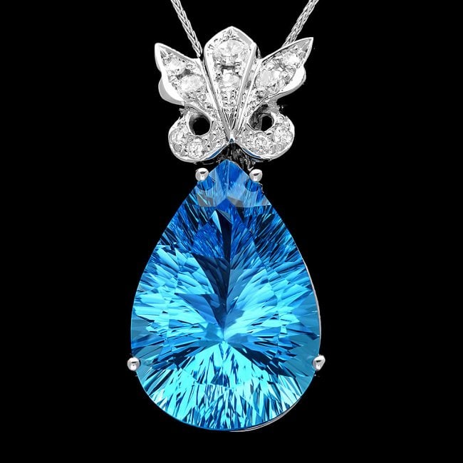14k Gold 25.00ct Topaz 0.45ct Diamond Pendant: Retail: $5,900.00 ****** 14k Gold 25.00ct Topaz 0.45ct Diamond Pendant ****** Metal: 14k Solid White Gold / Size: 16 / Total Item Weight: 12.0 grams / Country Made: United States / / Main Stone: Topaz