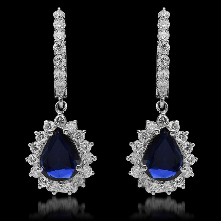 14K Gold 1.81ct Sapphire & 1.68ct Diamond Earrings: Retail: $5,840.00******14k Gold Sapphire & Diamond Earrings ****** Metal: 14K Solid White Gold / Total Item Weight: 5.1 grams / Country Made: United States / / Main Stone: Sapphire / Color: Dark Blue 