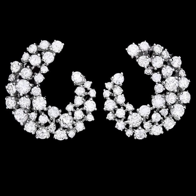 14k White Gold 4.40ct Diamond Earrings: Retail: $13,600.00 ****** 14k White Gold 4.40ct Diamond Earrings ****** Metal: 14k Solid White Gold / Total Item Weight: 7.5 grams / Country Made: United States / / Main Stone: Diamond / Color: White 