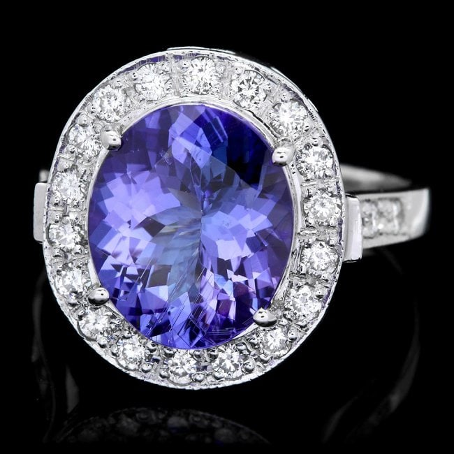 14k Gold 5.00ct Tanzanite 0.70ct Diamond Ring: Retail: $13,500.00 ****** 14k Gold 5.00ct Tanzanite 0.70ct Diamond Ring ****** Metal: 14k Solid White Gold / Size: 7.5 / Total Item Weight: 6.5 grams / Country Made: United States / / Main Stone: Tanz
