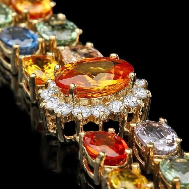 14k Gold 26.81ct Sapphire 1.50ct Diamond Bracelet: Retail: $16,800.00 ****** 14k Gold 26.81ct Sapphire 1.50ct Diamond Bracelet ****** Metal: 14k Solid Yellow Gold / Size: 7.5 / Total Item Weight: 21.4 grams / Country Made: United States / / Main Stone