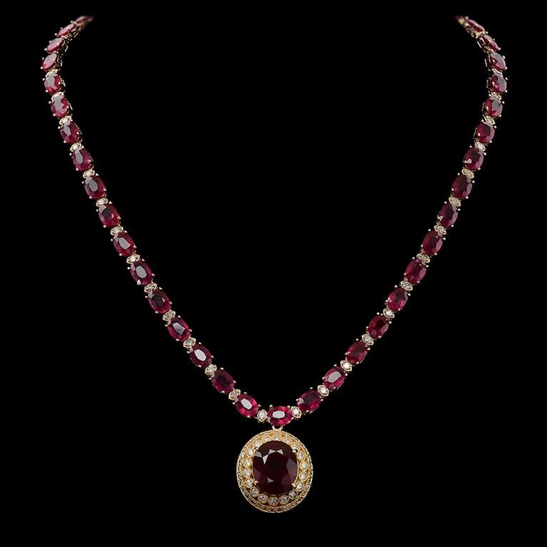 14K Gold 59.34ct Ruby 3.10ct Diamond Necklace: Retail: $29,920.00******14K Gold Ruby & Diamond Necklace ****** Metal: 14K Solid Yellow Gold / Total Item Weight: 34.4 grams / Country Made: United States / / Main Stone: Ruby/ Color: Red / Carat Tota