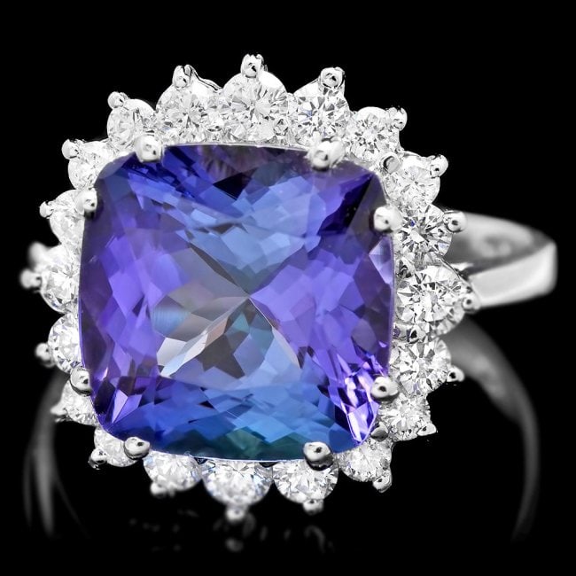 14k Gold 5.50ct Tanzanite 0.80ct Diamond Ring: Retail: $14,800.00 ****** 14k Gold 5.50ct Tanzanite 0.80ct Diamond Ring ****** Metal: 14k Solid White Gold / Size: 6.75 / Total Item Weight: 5.0 grams / Country Made: United States / / Main Stone: Tan