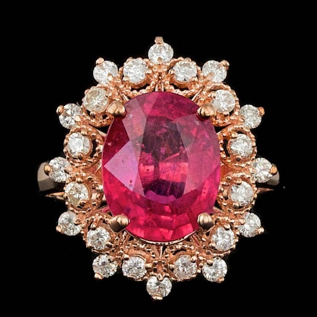14k Rose Gold 4.00ct Ruby 0.65ct Diamond Ring: Retail: $6,400.00 ****** 14k Rose Gold 4.00ct Ruby 0.65ct Diamond Ring ****** Metal: 14k Solid Rose Gold / Size: 7 / Total Item Weight: 5.0 grams / Country Made: United States / / Main Stone: Ruby / C
