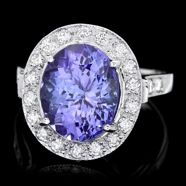 14k Gold 5.00ct Tanzanite 0.70ct Diamond Ring: Retail: $13,500.00 ****** 14k Gold 5.00ct Tanzanite 0.70ct Diamond Ring ****** Metal: 14k Solid White Gold / Size: 7.25 / Total Item Weight: 6.5 grams / Country Made: United States / / Main Stone: Tan