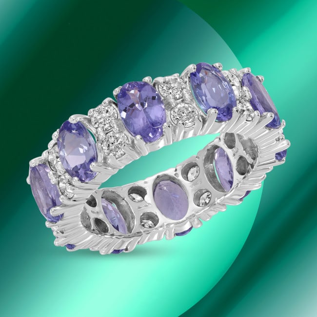14k Gold 5.00ct Tanzanite 1.80ct Diamond Eternity Ring: Retail: $14,920.00 ****** 14k Gold 5.00ct Tanzanite 1.80ct Diamond Eternity Ring ****** Metal: 14k Solid White Gold / Size: 6.75 / Total Item Weight: 5.6 grams / Country Made: USA / / Main Stone: Tanz