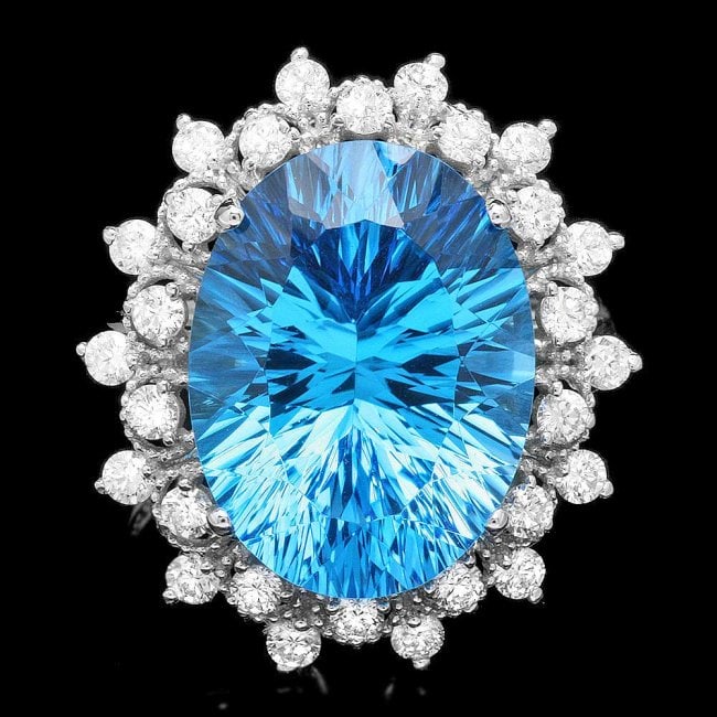 14k White Gold 11.00ct Topaz 0.80ct Diamond Ring: Retail: $6,200.00 ****** 14k White Gold 11.00ct Topaz 0.80ct Diamond Ring ****** Metal: 14k Solid White Gold / Size: 7 / Total Item Weight: 7.2 grams / Country Made: United States / / Main Stone: Topa