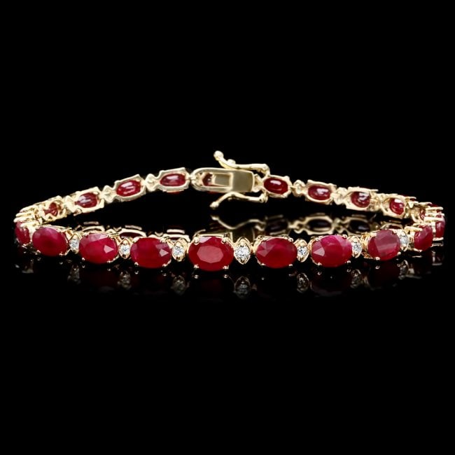 14k Gold 16.00ct Ruby 0.55ct Diamond Bracelet: Retail: $11,600.00 ****** 14k Gold 16.00ct Ruby 0.55ct Diamond Bracelet ****** Metal: 14k Solid Yellow Gold / Size: 7.25 / Total Item Weight: 11 grams / Country Made: United States / / Main Stone: Rub