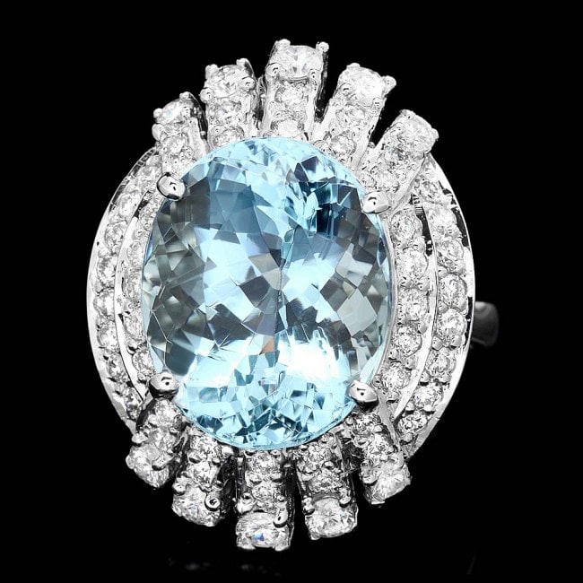 14k Gold 9.00ct Aquamarine 1.25ct Diamond Ring: Retail: $11,950.00 ****** 14k Gold 9.00ct Aquamarine 1.25ct Diamond Ring ****** Metal: 14k Solid White Gold / Size: 7 / Total Item Weight: 8.0 grams / Country Made: United States / / Main Stone: Aquam