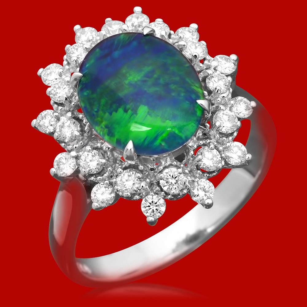 14k Gold 1.81ct Opal 0.65ct Diamond Ring: Retail: $3,700.00 ******14k Gold 1.81ct Opal 0.65ct Diamond Ring ****** Metal: 14k Solid White Gold / Size: 7 / Total Item Weight: 4.3 grams / Country Made: United States / / Main Stone: Natural Opal 