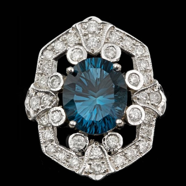 14k White Gold 6.00ct Topaz 2.30ct Diamond Ring: Retail: $7,400.00 ****** 14k White Gold 6.00ct Topaz 2.30ct Diamond Ring ****** Metal: 14k Solid White Gold / Size: 7.25 / Total Item Weight: 9.0 grams / Country Made: United States / / Main Stone: To
