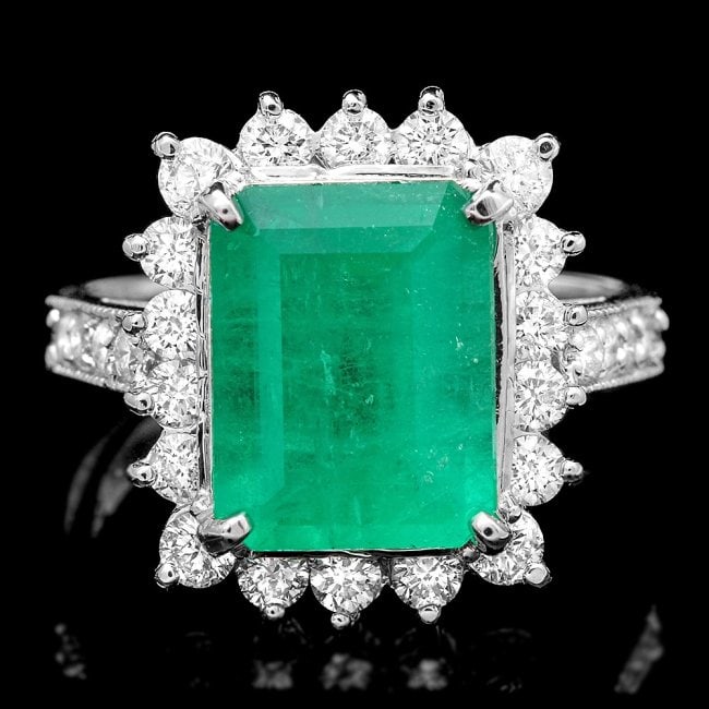 14k White Gold 4.00ct Emerald 1.00ct Diamond Ring: Retail: $24,750.00 ****** 14k White Gold 4.00ct Emerald 1.00ct Diamond Ring ****** Metal: 14k Solid White Gold / Size: 7 / Total Item Weight: 7.0 grams / Country Made: United States / / Main Stone: Em