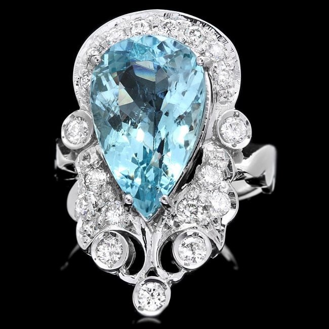 14k Gold 4.50ct Aquamarine 0.75ct Diamond Ring: Retail: $8,300.00 ****** 14k Gold 4.50ct Aquamarine 0.75ct Diamond Ring ****** Metal: 14k Solid White Gold / Size: 6 / Total Item Weight: 7.0 grams / Country Made: United States / / Main Stone: Aquama