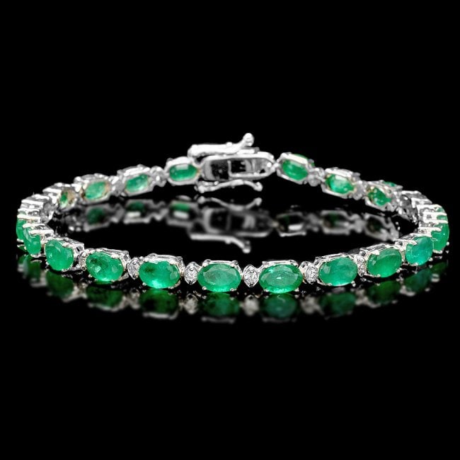 18k Gold 11ct Emerald 0.60ct Diamond Bracelet: Retail: $11,750.00 ****** 18k Gold 11ct Emerald 0.60ct Diamond Bracelet ****** Metal: 18k Solid White Gold / Size: 7.5 / Total Item Weight: 9.5 grams / Country Made: United States / / Main Stone: Emer