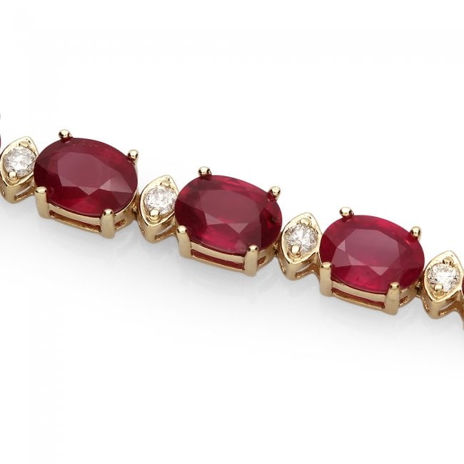 14k Gold 27.50ct Ruby 0.90ct Diamond Bracelet: Retail: $8,900.00 ****** 14k Gold 27.50ct Ruby 0.90ct Diamond Bracelet ****** Metal: 14k Solid Yellow Gold / Size: 7 / Total Item Weight: 17.0 grams / Country Made: United States / / Main Stone: Ruby 