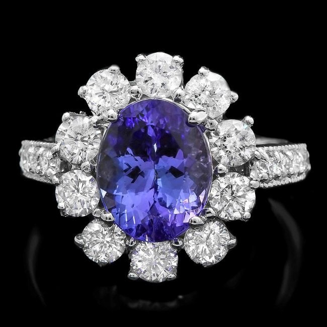 14k Gold 2.60ct Tanzanite 1.60ct Diamond Ring: Retail: $11,570.00 ****** 14k Gold 2.60ct Tanzanite 1.60ct Diamond Ring ****** Metal: 14k Solid White Gold / Size: 7 / Total Item Weight: 6 grams / Country Made: United States / / Main Stone: Tanzanit