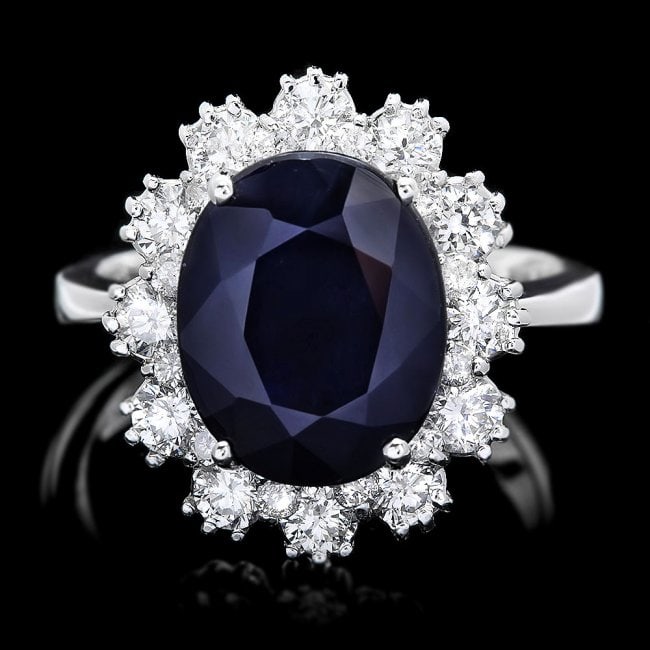 14k Gold 6.50ct Sapphire 1.25ct Diamond Ring: Retail: $11,600.00 ****** 14k Gold 6.50ct Sapphire 1.25ct Diamond Ring ****** Metal: 14k Solid White Gold / Size: 7 / Total Item Weight: 6.0 grams / Country Made: United States / / Main Stone: Sapphir