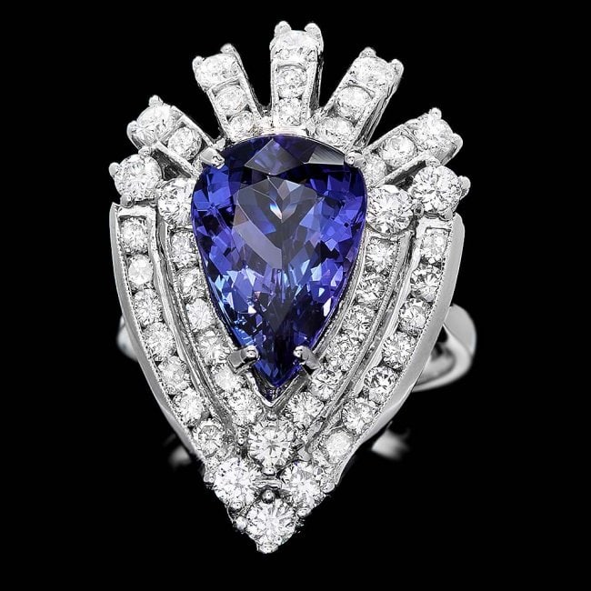 14k Gold 4.50ct Tanzanite 2.30ct Diamond Ring: Retail: $18,200.00 ****** 14k Gold 4.50ct Tanzanite 2.30ct Diamond Ring ****** Metal: 14k Solid White Gold / Size: 7 / Total Item Weight: 8.5 grams / Country Made: United States / / Main Stone: Tanzan