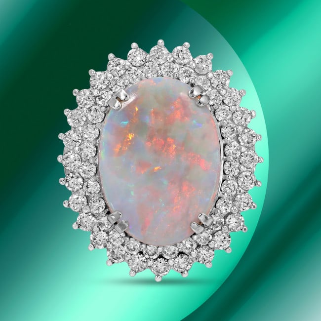 14k Gold 6.49ct Opal 2.49ct Diamond Ring: Retail: $17,700.00 ****** 14k Gold 6.49ct Opal 2.49ct Diamond Ring ****** Metal: 14k Solid White Gold / Size: 7 / Total Item Weight: 13.9 grams / Country Made: USA / / Main Stone: Opal / Color: White 