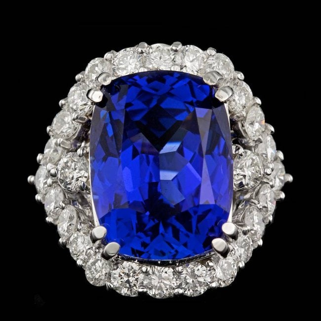 18k Gold 16.00ct Tanzanite 2.60ct Diamond Ring: Retail: $48,500.00 ****** 18k Gold 16.00ct Tanzanite 2.60ct Diamond Ring ****** Metal: 18k Solid White Gold / Size: 7 / Total Item Weight: 11.3 grams / Country Made: United States / / Main Stone: Tanz