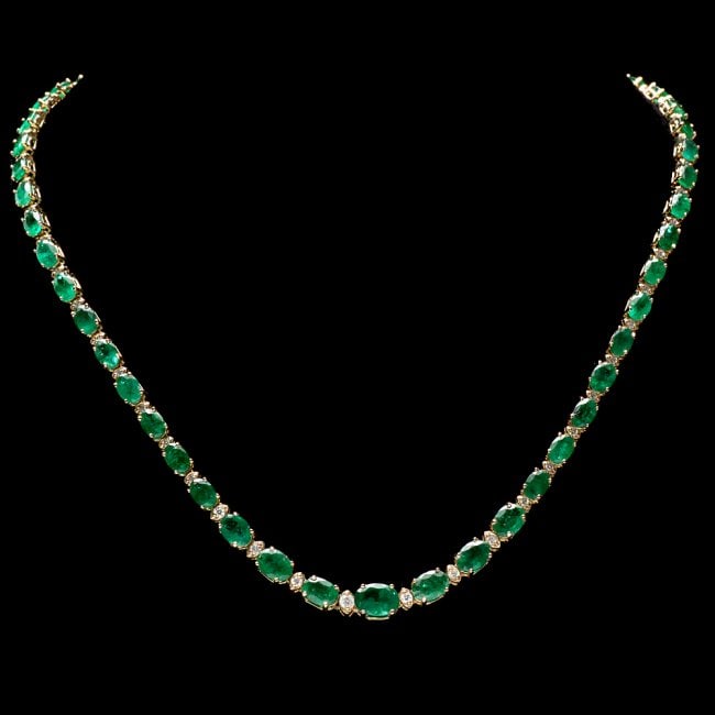 14k Gold 23ct Emerald 1.10ct Diamond Necklace: Retail: $27,850.00 ****** 14k Gold 23ct Emerald 1.10ct Diamond Necklace ****** Metal: 14k Solid Yellow Gold / Size: 17.5 / Total Item Weight: 19.0 grams / Country Made: United States / / Main Stone: E