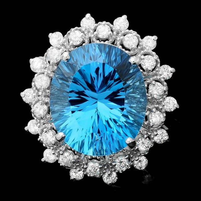 14k White Gold 8.50ct Topaz 0.80ct Diamond Ring: Retail: $7,650.00 ****** 14k White Gold 8.50ct Topaz 0.80ct Diamond Ring ****** Metal: 14k Solid White Gold / Size: 7 / Total Item Weight: 7.0 grams / Country Made: United States / / Main Stone: Topaz
