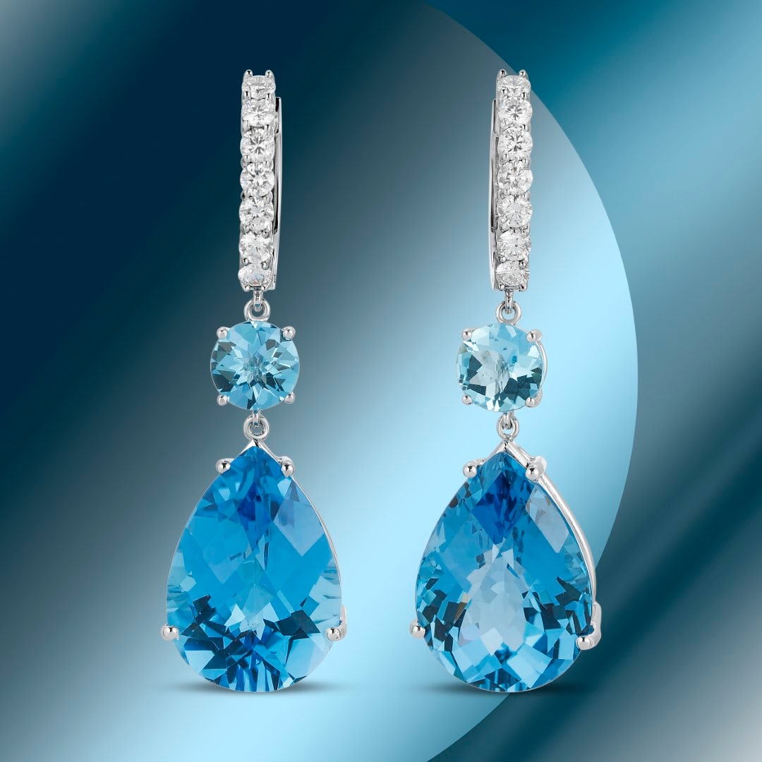 14K Gold 49.51cts Blue Topaz & 1.47cts Diamond Earrings: Retail: $14,136***** 14K Gold 49.51cts Blue Topaz & 1.47cts Diamond Earrings****** Metal: 14K White Gold/ Total Wt.: 20.7g/ Country Made USA// Main Stone: Topaz / Carat Total Wt: 49.51cts / Treatment: