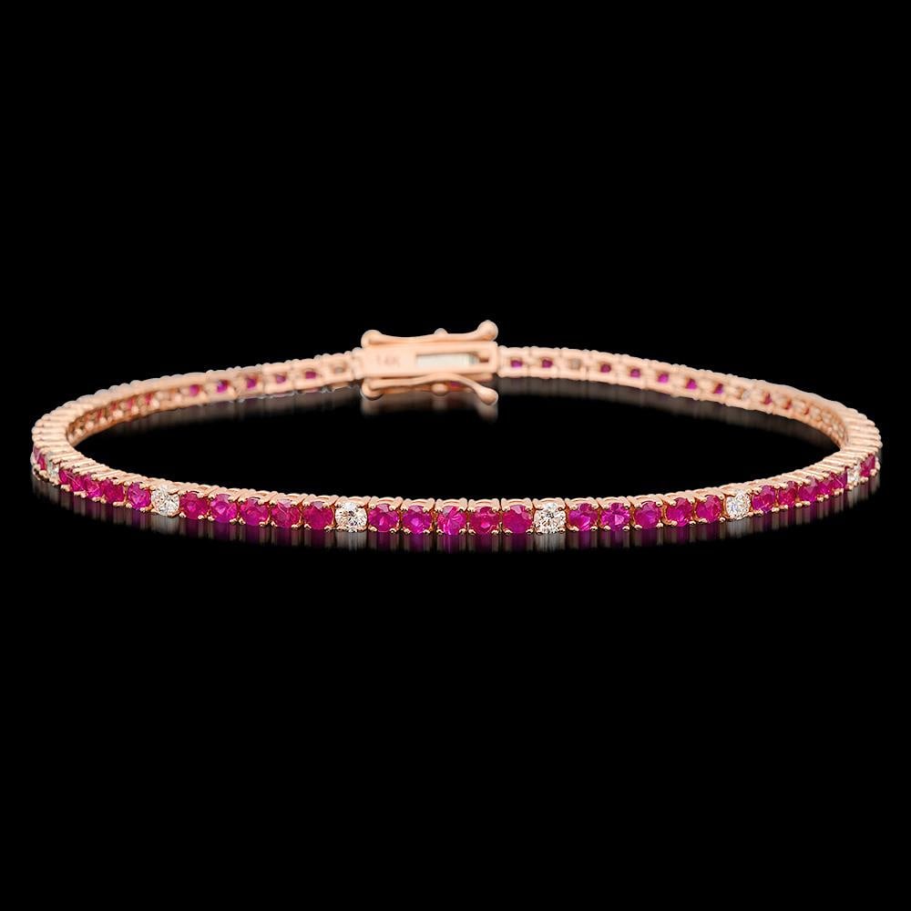 14k Rose Gold 3.21ct Ruby 0.75ct Diamond Bracelet: Retail: $7,565.00 ****** 14k Rose Gold 3.21ct Ruby 0.75ct Diamond Bracelet ****** Metal: 14K Rose Gold / Total Item Weight: 7.1 grams / Country Made: United States / / Main Stone: Ruby / Color: Red / 