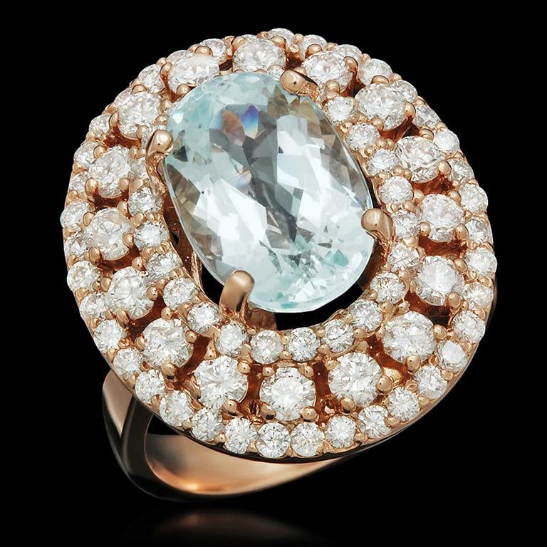 14K Gold 4.35ct Aquamarine 2.09ct Diamond Ring: Retail: $11,285.00******14K Gold Aquamarine & Diamond Ring ****** Metal: 14K Solid Rose Gold / Total Item Weight: 9.7 grams / Country Made: United States / / Main Stone: Aquamarine / Color: Very Light