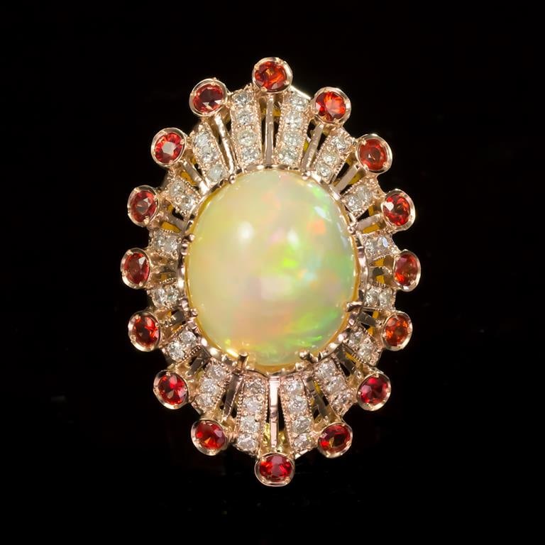 14K Gold 13.28ct Opal, 1.28ct Orange Sapphire 1.10ct Diamond Ring: Retail: $16,460.00****** Opal, Orange Sapphire & Diamond Ring ****** Metal: 14K Solid Rose Gold / Total Item Weight: 13.6 grams / Country Made: United States / / Main Stone: Opal / Color: Play of Colo