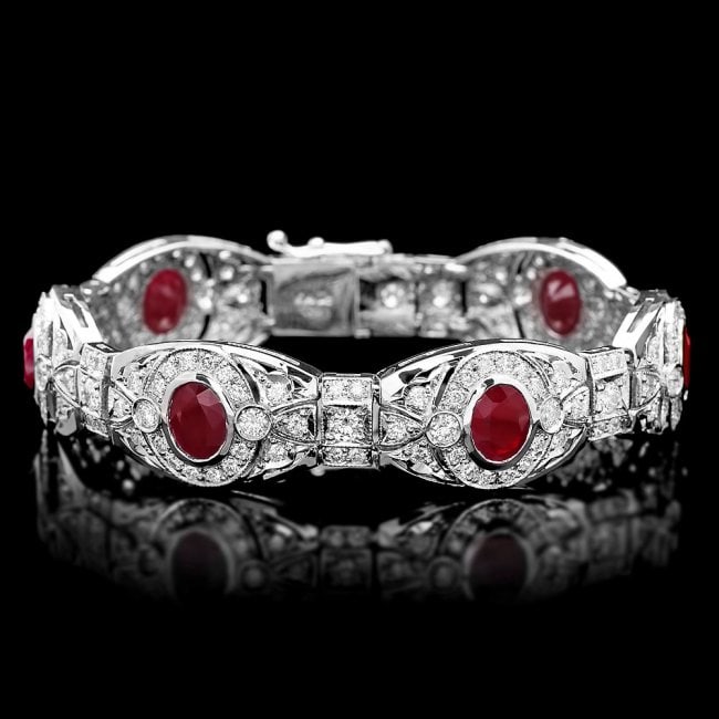 14k Gold 10.80ct Ruby 6.90ct Diamond Bracelet: Retail: $42,500.00 ****** 14k Gold 10.80ct Ruby 6.90ct Diamond Bracelet ****** Metal: 14k Solid White Gold / Size: 7 / Total Item Weight: 31.5 grams / Country Made: United States / / Main Stone: Ruby 