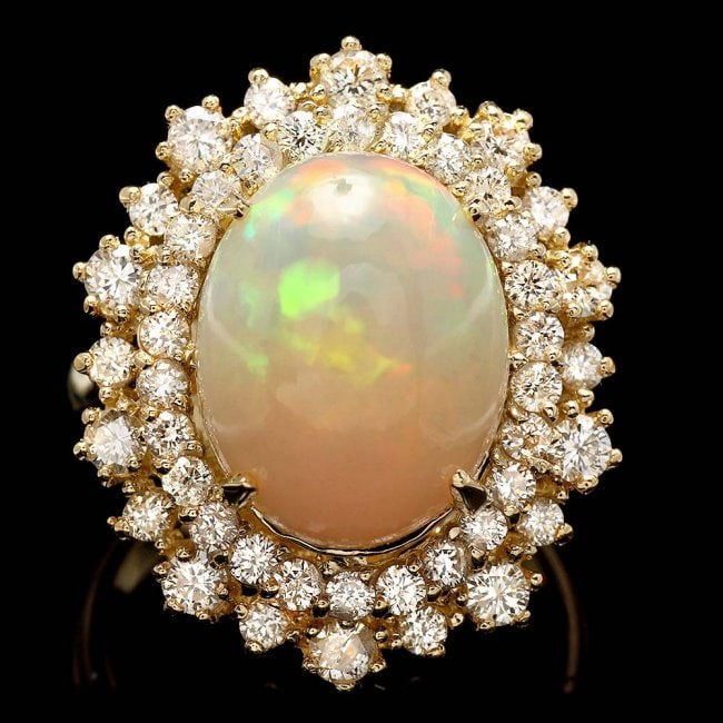 14k Yellow Gold 5.00ct Opal 1.42ct Diamond Ring: Retail: $14,870.00 ****** 14k Yellow Gold 5.00ct Opal 1.42ct Diamond Ring ****** Metal: 14k Solid Yellow Gold / Size: 6.75 / Total Item Weight: 8.0 grams / Country Made: United States / / Main Stone: 