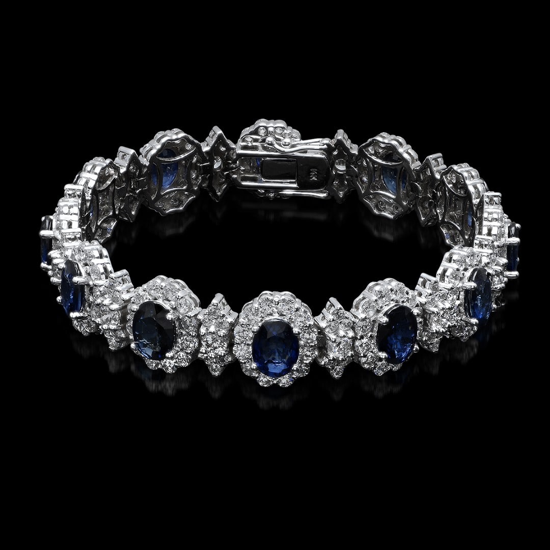 14K White Gold,14.00cts Sapphire & 11.64cts Diamond Bracelet: Retail: $64,100.00****** 14K White Gold,14.00cts Sapphire & 11.64 cts.Diamond Bracelet******* Metal: 14K White Gold/ Total Wt.: 27.0g/ Country Made USA/ Main Stone: Sapphire/ Adjacent Stone: Diamond/ 