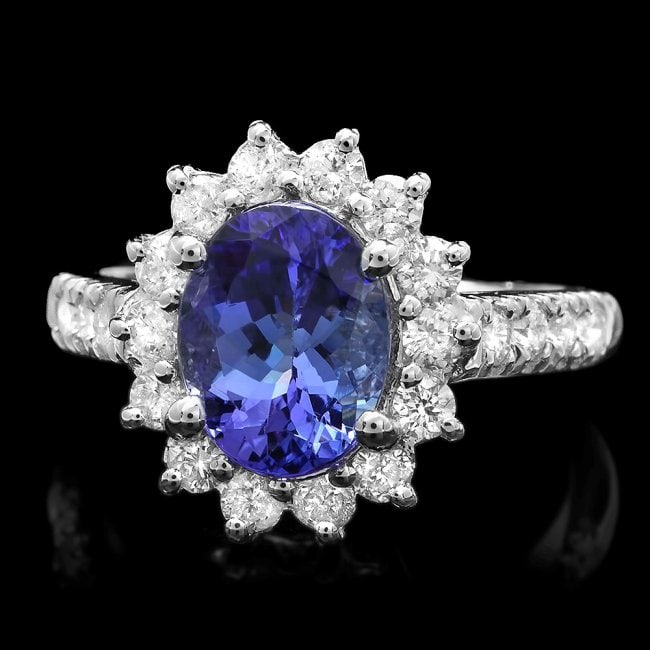 14k White Gold 2.5ct Tanzanite 1ct Diamond Ring: Retail: $8,000.00 ****** 14k White Gold 2.5ct Tanzanite 1ct Diamond Ring ****** Metal: 14k Solid White Gold / Size: 7 / Total Item Weight: 5 grams / Country Made: United States / / Main Stone: Tanzani